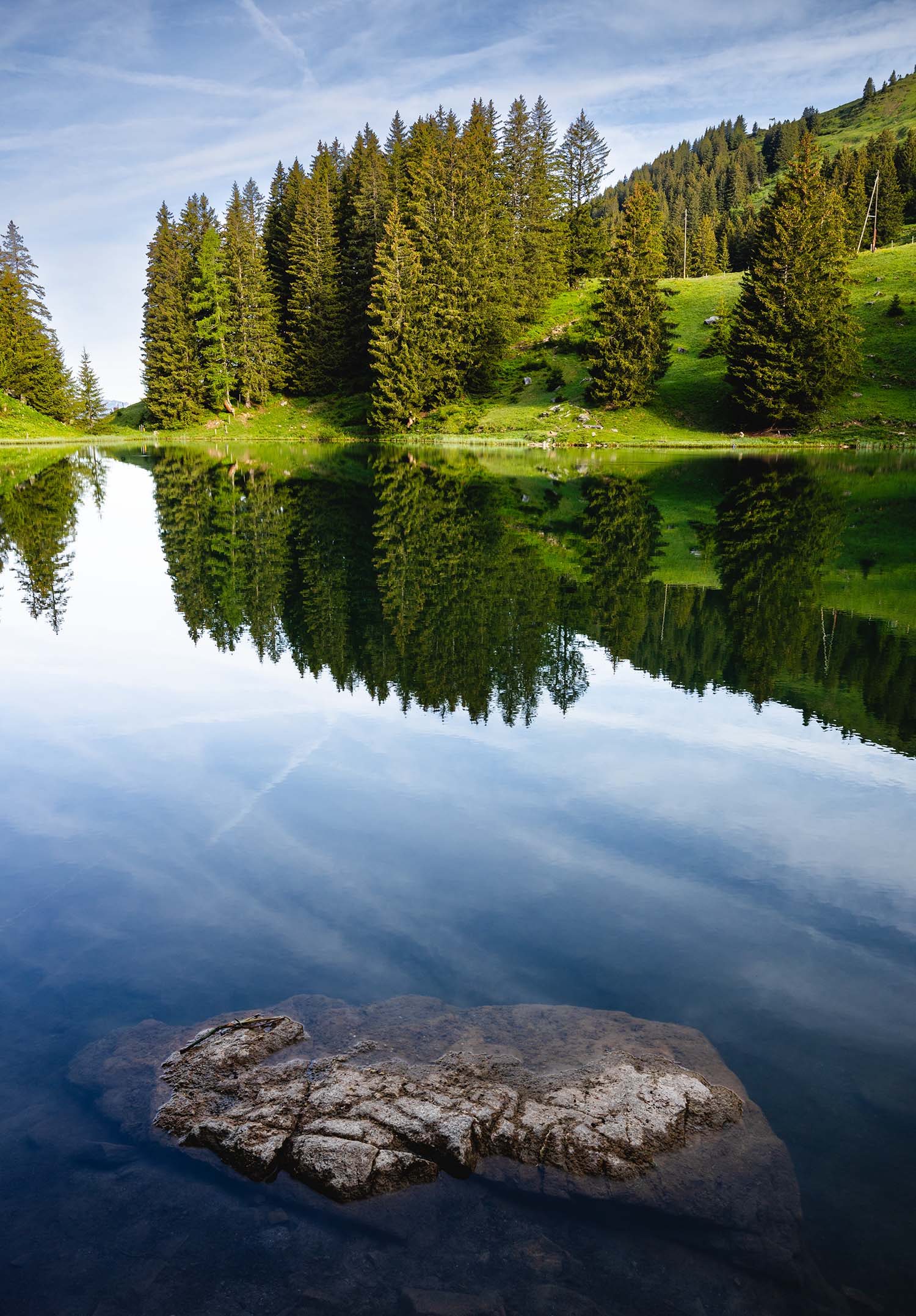 picture of lake lac retaud with trees reflection