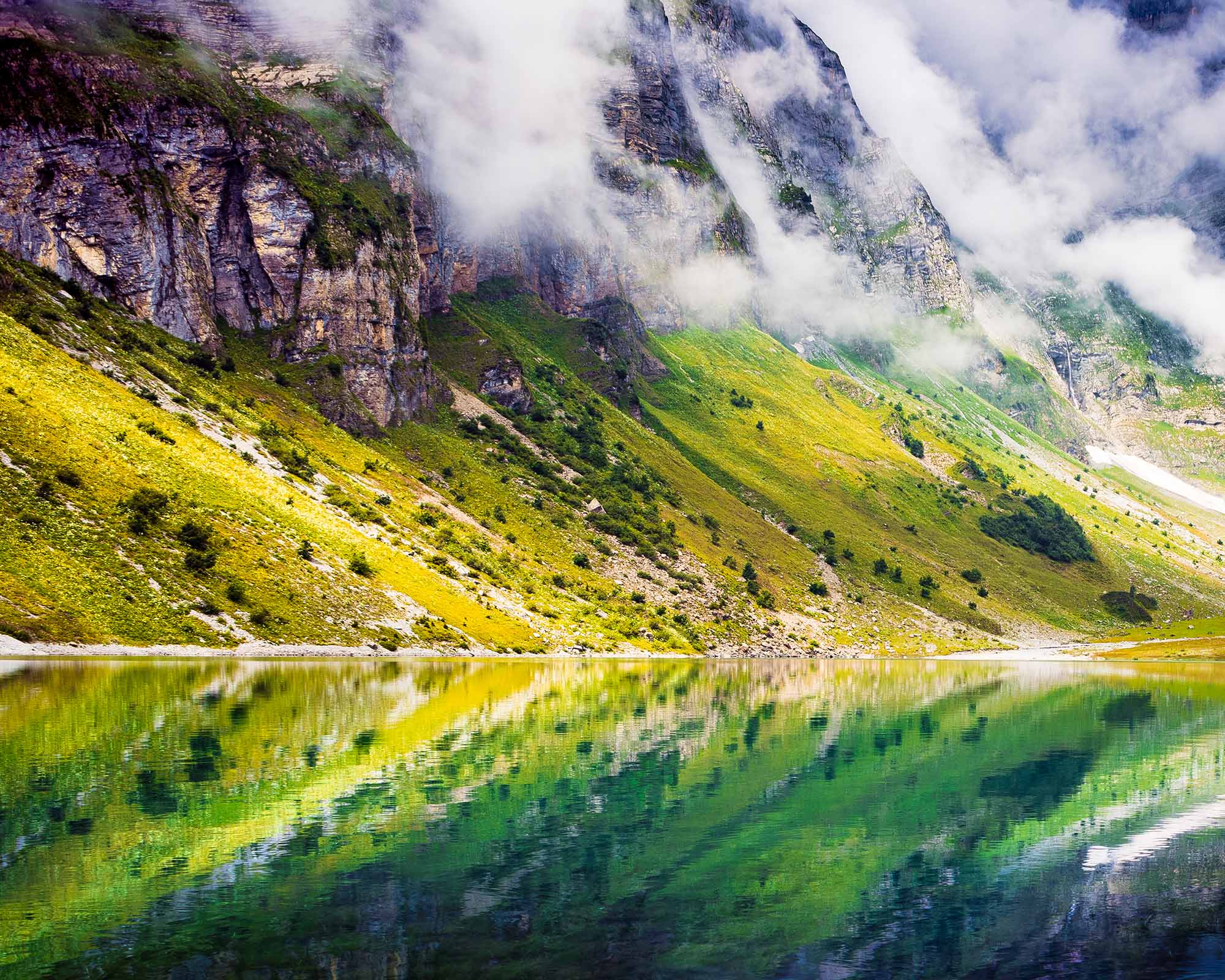 picture of mountain reflection in the lake oberblegisee in switzerland